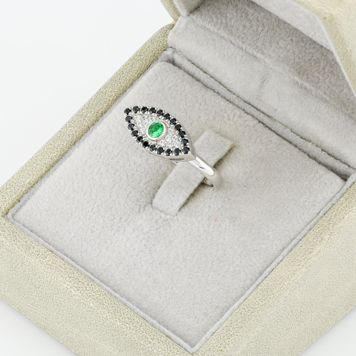 Faceted tsavorite evil eye silver ring