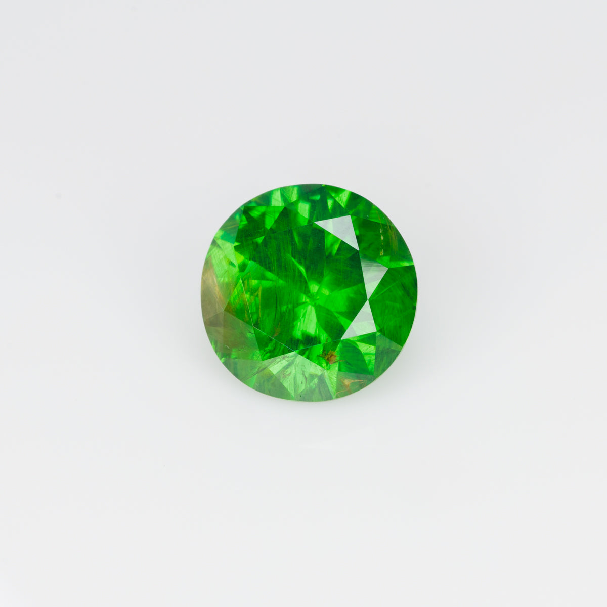 2.16 CTs, Vivid green faceted Russian demantoid garnet