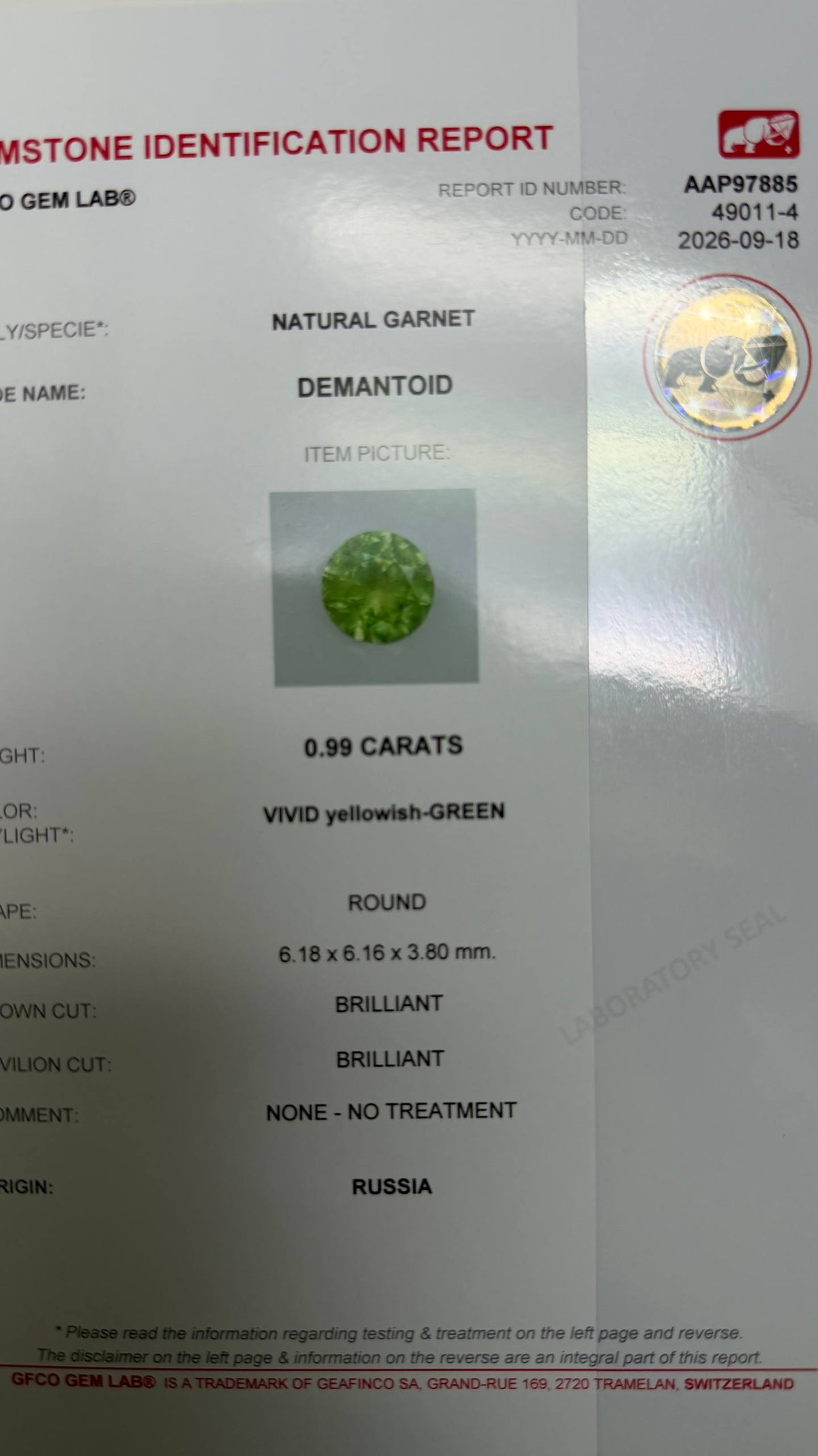 0.99 ct, Vivid yellowish grene faceted Russian demantoid garnet