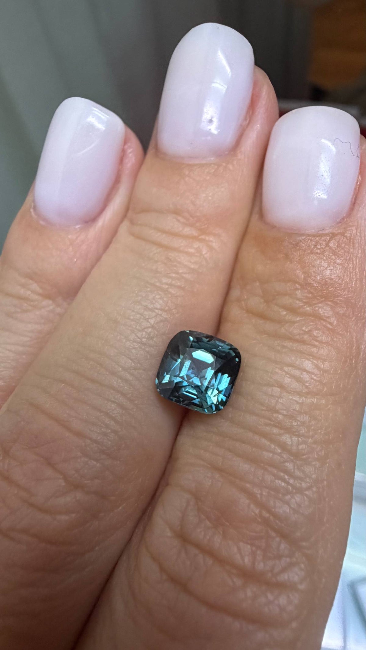2.44 cts, Faceted natural teal sapphire