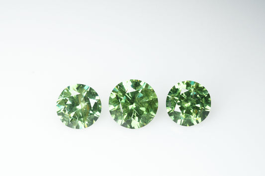 Russian demantoid set, faceted demantoid garnet set 1,64 ct