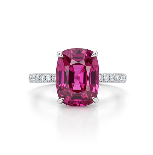 Golden ring with faceted rhodolite garnet