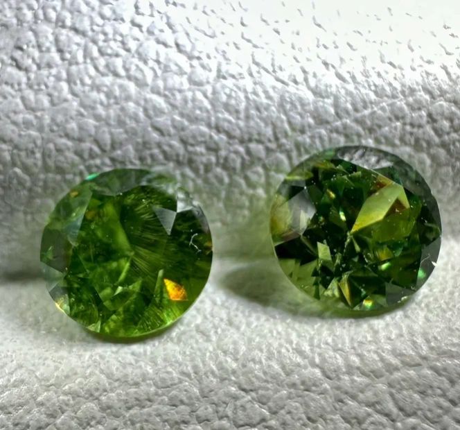 Faceted demantoid pair 0.75 ct