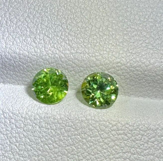 Faceted demantoid pair 0.75 ct