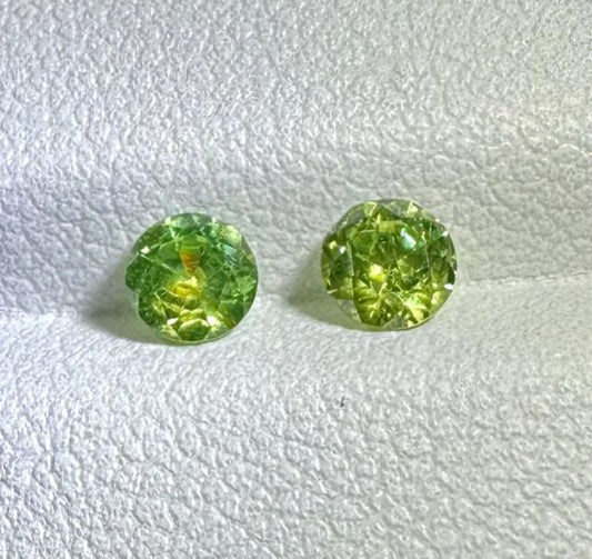 Faceted demantoid pair