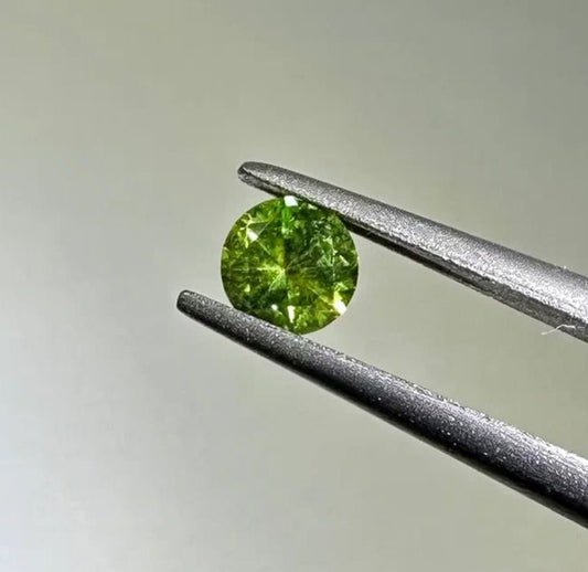 Faceted demantoid garnet