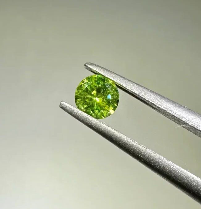 Faceted demantoid garnet