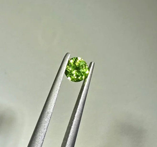 Faceted demantoid garnet