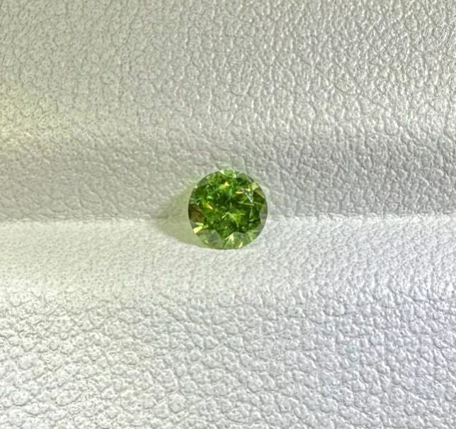 Faceted demantoid garnet