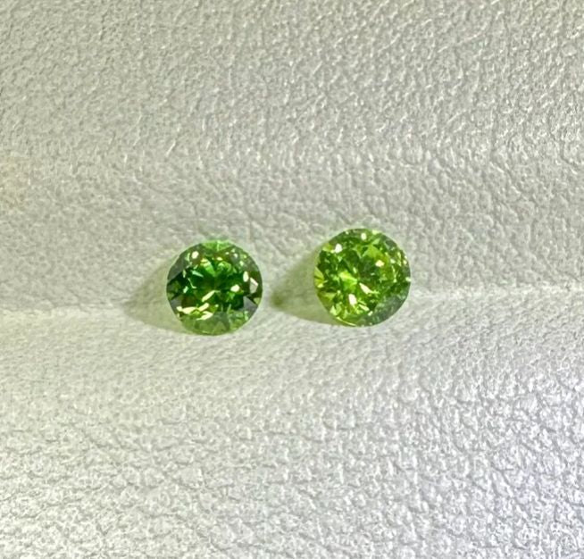 Faceted demantoid pair, 1.3 ct