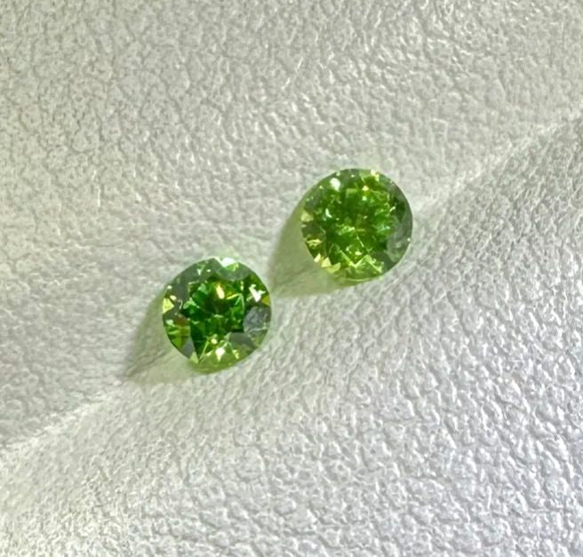 Faceted demantoid pair, 1.3 ct