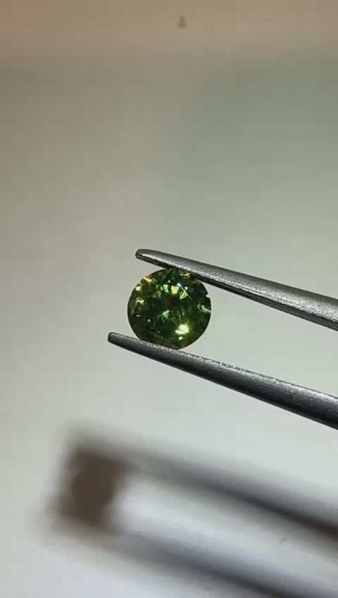 Faceted demantoid 0.6 ct