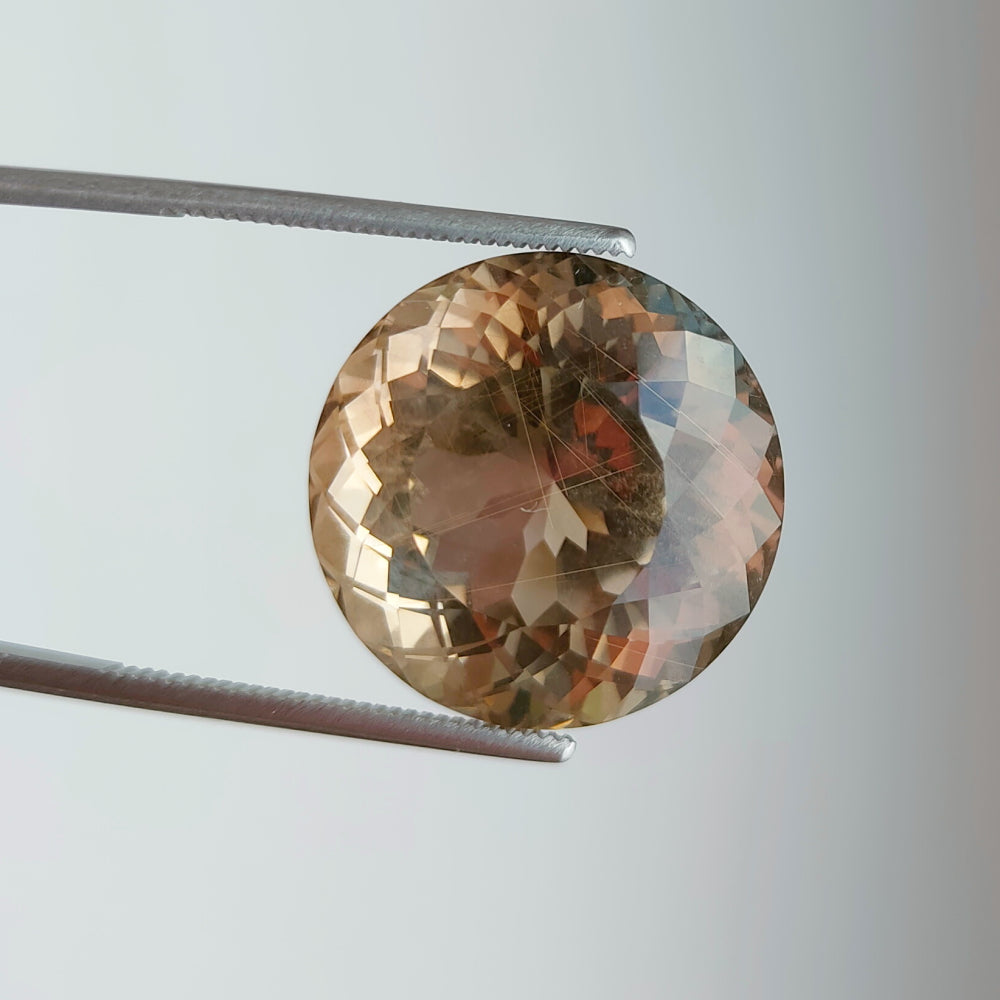 Faceted rutilated smoky quartz 26.5 ct