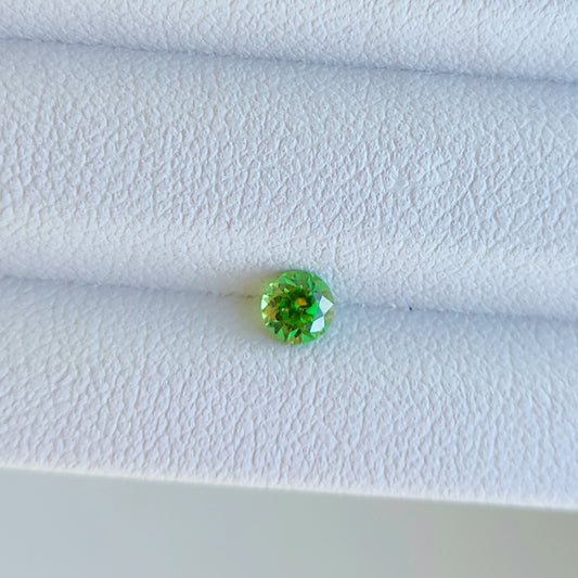 Faceted demantoid garnet 0.13 ct