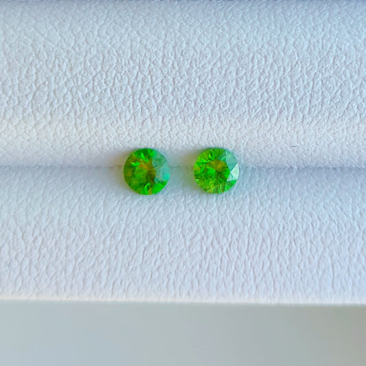 Faceted pair demantoid garnet