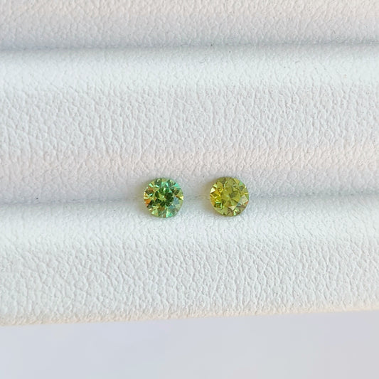 Faceted demantoid pair 0.32 ct
